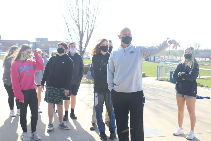 Leading his class, science teacher Eric Thomas takes his zoology class to a new area on Monday, April 5.
