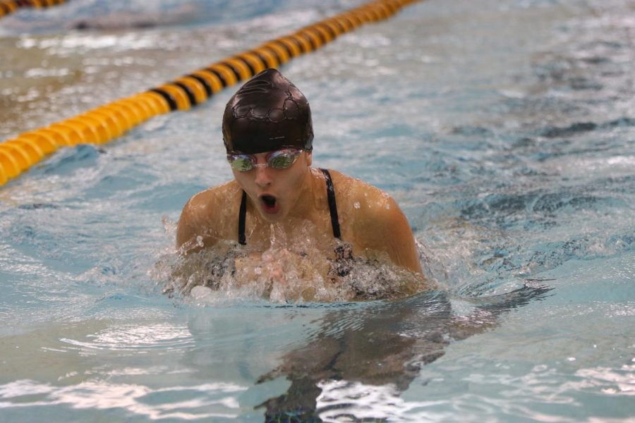 Swimming the butterfly, freshman Sireen Fraitekh comes up for air.