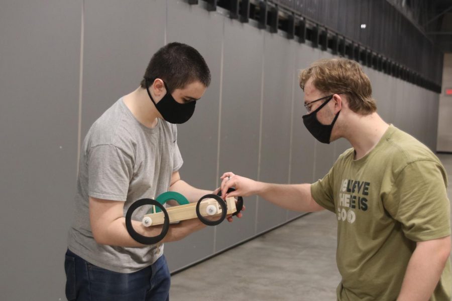 Calibrating their vehicle, junior Jordan Manning keeps a steady hand to ensure precise movements for their vehicle Wednesday, March 31. 