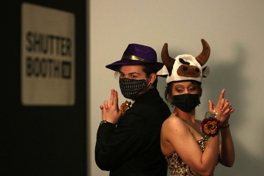 A photo booth with hats as props gave students a memory to take home.