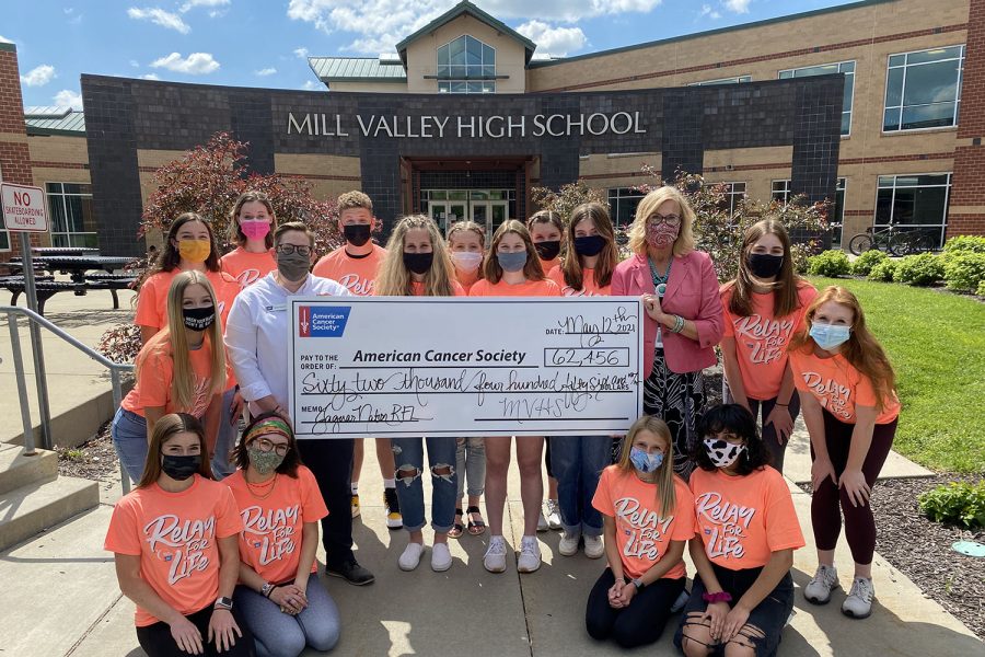 The Relay for Life committee takes a photo with principal Dr. Gail Holder and American Cancer Society representative McKenzie Marshall Wednesday, May 12.