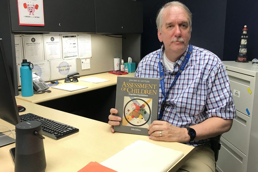 Starting+his+11th+year+as+a+school+psychologist%2C+Michael+Austin+looks+forward+to+getting+to+know+the+students+and+staff+who+come+to+his+office.+One+of+Austins+prized+possessions+is%0Aa+fifth+edition+of+a+childrens+psychology+book.