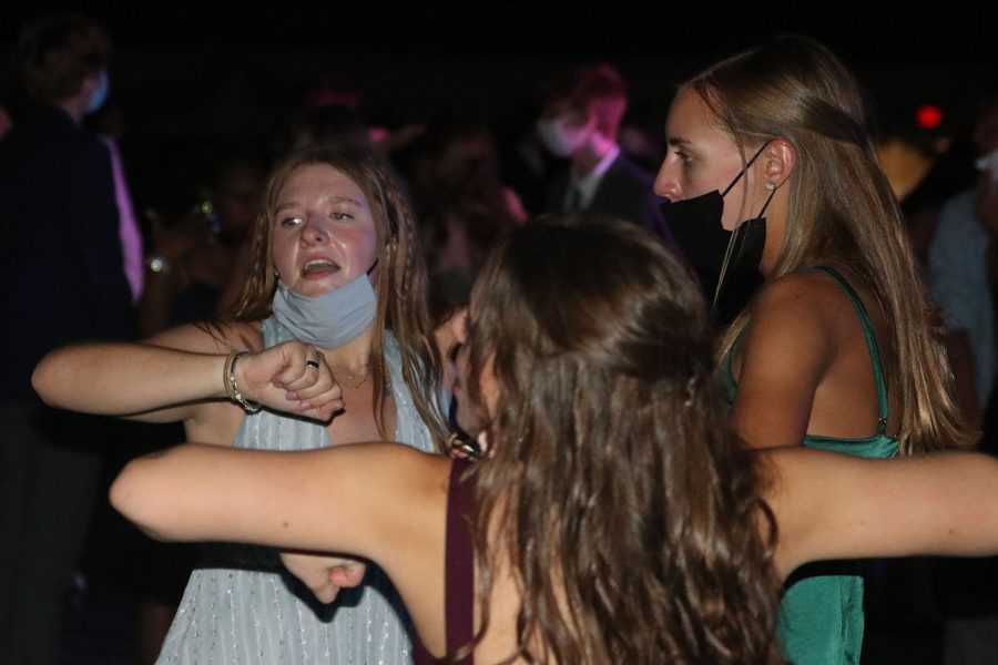 Along with sophomores Ellie Walker and Chaley Spaulding, sophomore Lucy Roy dances in a circle.
