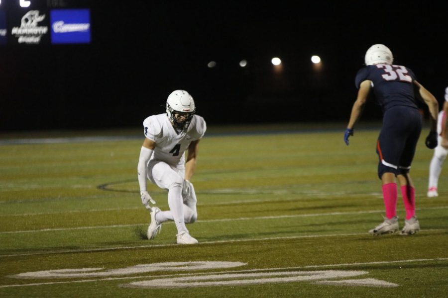 Attempting to lose his defender, senior wide receiver Sean Allerheiligen prepares to receive the ball. 