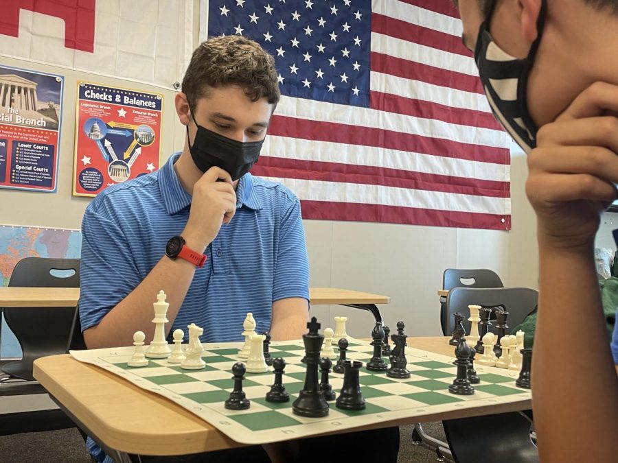 Thinking carefully, senior Colin Keltner and junior Isaac Steiner plan out their next moves 