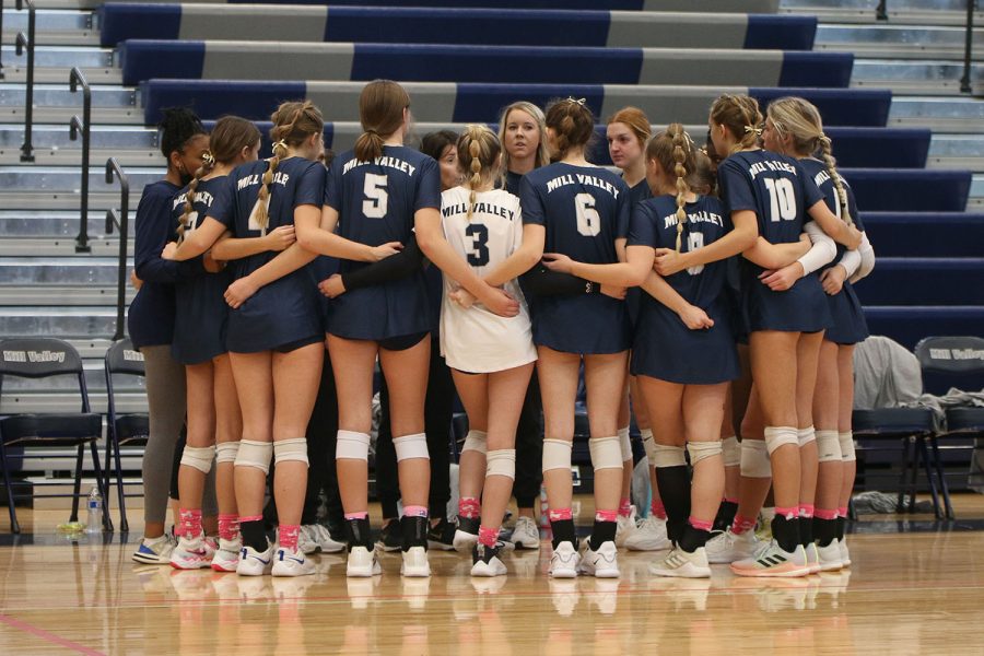 Prior to the game against Pittsburg, the girls volleyball team huddles together during substate Saturday, Oct. 23. The team defeated Pittsburg in two sets and fell to SJA in three sets, losing their chance to move on to state.