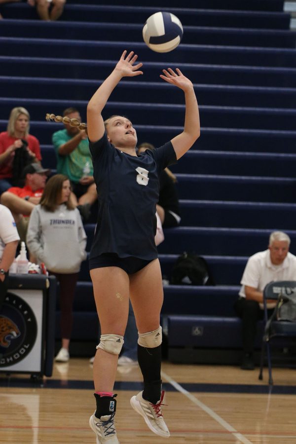 After being passed the ball, senior Sydney Fiatte sets the ball for her teammates to hit.