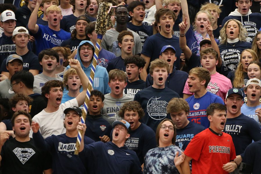 After the team scores a point against SJA, the student section erupts into cheers.