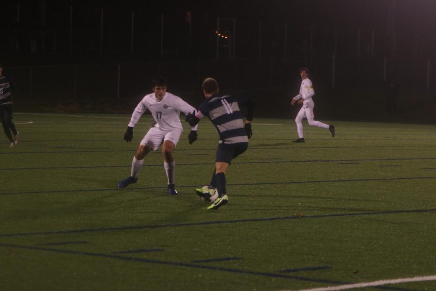 Approaching a defender junior Dylan Ashford uses footwork to out-psych against his opponent. 