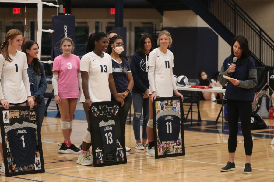 Before the game starts, head volleyball coach Debbie Fey recognizes the team's senior players