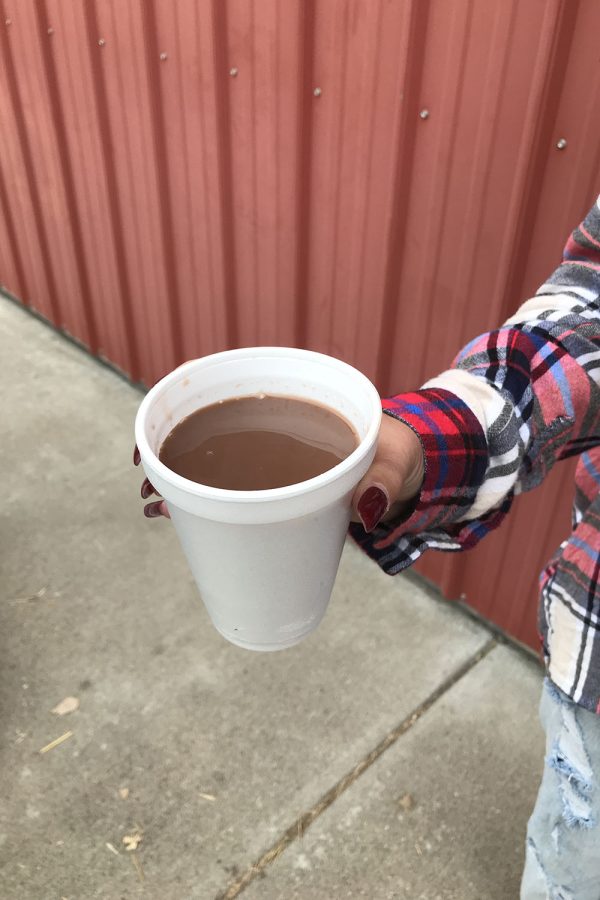 Sophomore Abigail Troilo holds the hot chocolate she purchased for $3.50.
