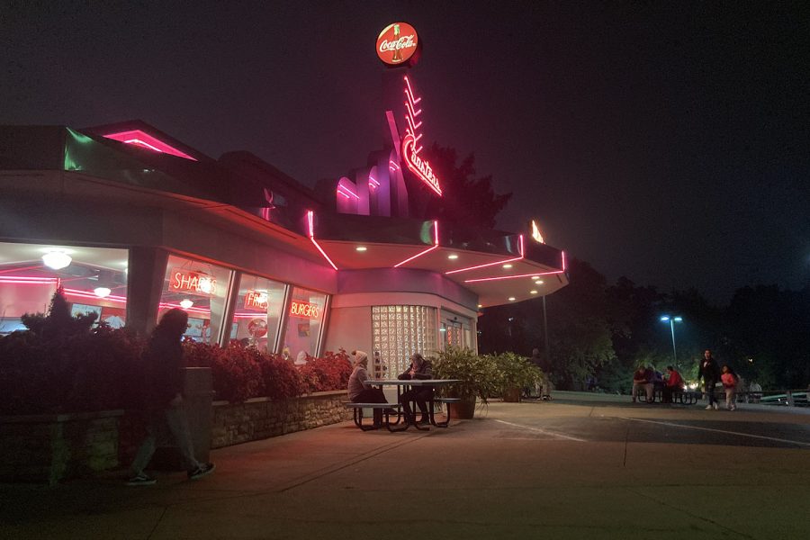 Taking a break from the haunted houses, individuals dine on a variety of meals at Coasters Drive-in.