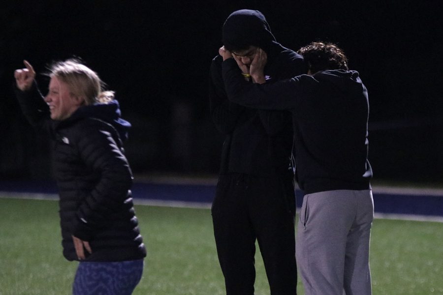 Upset after their loss in the tournament, seniors Danny Talavera and Adrian Dimond accept their defeat. 