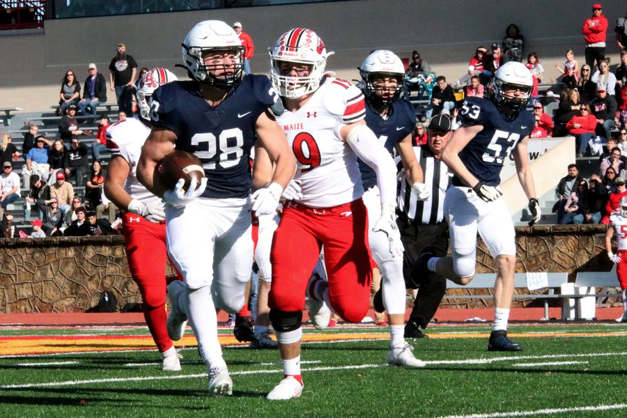 Advancing 12 yards down the field, senior wide receiver Reice Kennedy carries the ball safely to the end zone for a touchdown in the first quarter. 