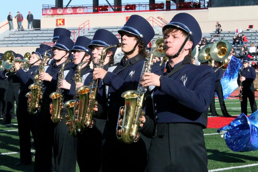 Performing at halftime, senior Fischer Unruh plays his saxophone during the band showcase.  