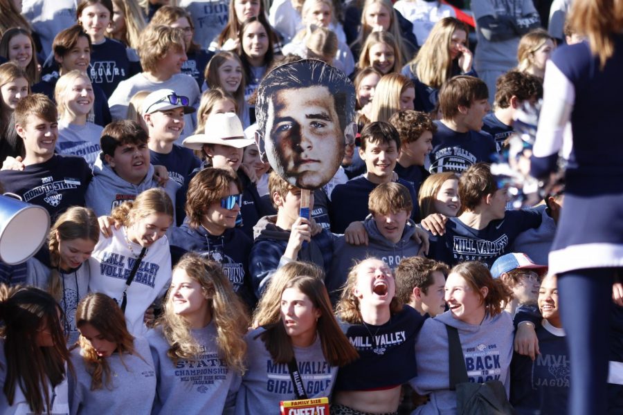 Students sway together while waiting for the team to be announced.