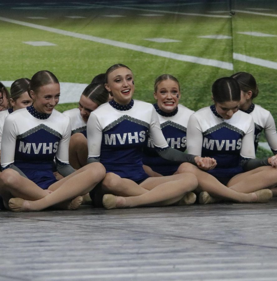 Realizing they took first at state, sophomore Trinity Baker can’t contain her smile.