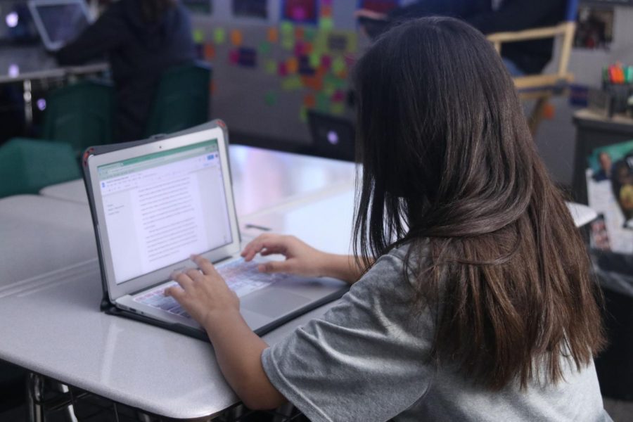 A student from Christopher Yancey’s ELT class works on her novel for NaNoWriMo.