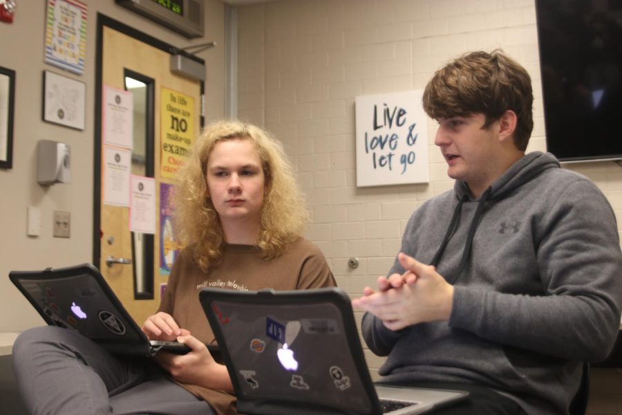 Sophomore Nathan Garner and senior Evan Harris discuss ideas for new scenes to add to “The Squatter”.