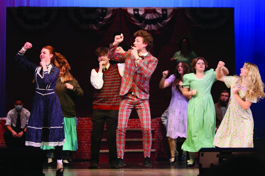 Harold Hill, played by junior Finn Campbell, leads the rest of the cast through a dance number Thursday, Nov. 4.