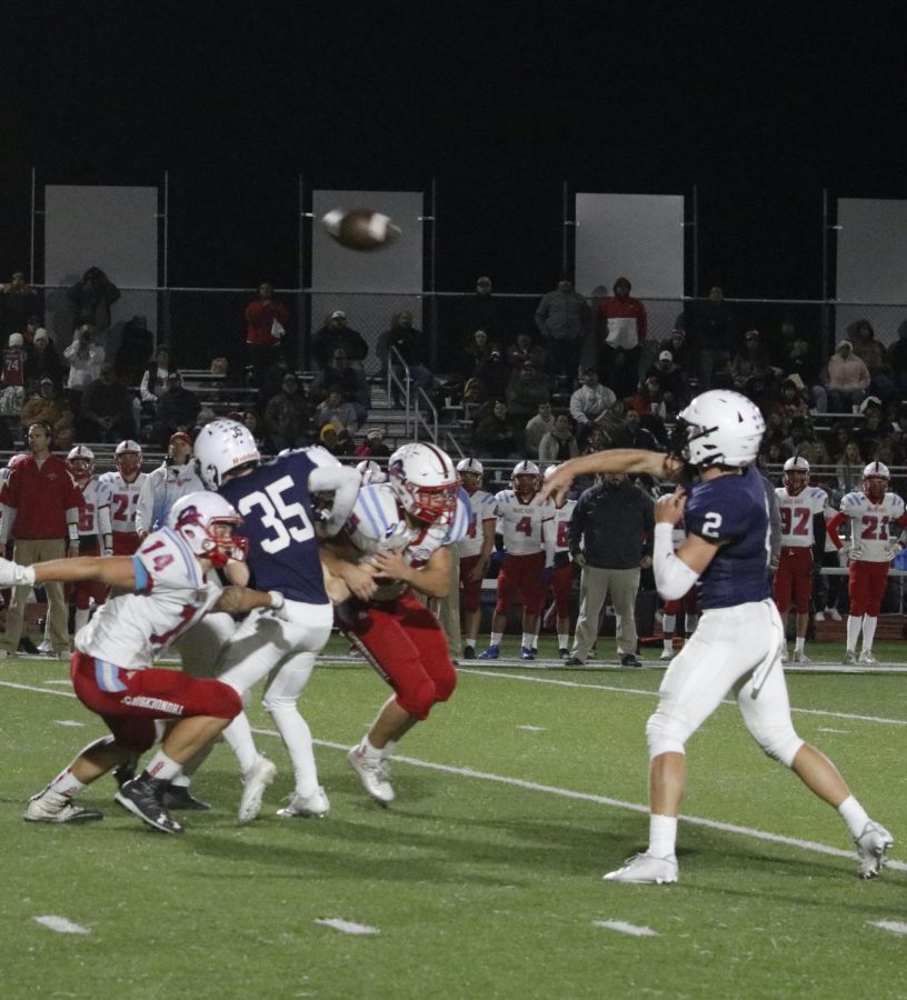 After finding an open receiver, junior Hayden Jay throws the ball to the endzone. 