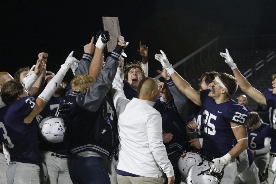 After their 42-7 win against Shawnee Heights, the team celebrates their Regional title.