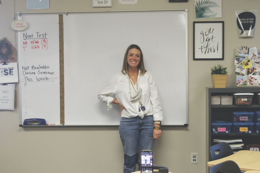 Having her set up to take her instagram picture is math teacher Sarah Sides. Sides instagram is about her outfits she wears to school.