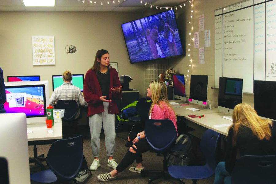 MVTV Producer senior Lauren Payne gives advice to junior Mary Caroline Graves  Tuesday,  Nov. 23