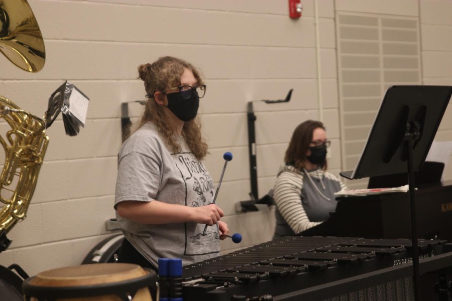 With her mallets in her hand, senior Anastasia O’Brien plays the xylophone.