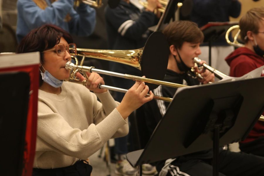 With her trombone, senior Olivia Franco practices a jazz song along with other students in the class