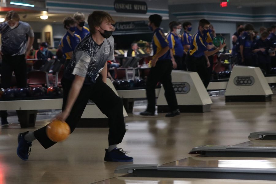 Ready to bowl, junior Brody Shulda keeps his eyes on the pins. 