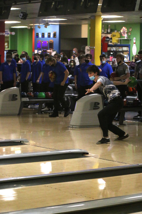 Throwing the ball, senior Jack Weber hopes for a strike. 
