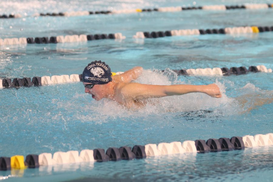 Arms extended, senior Brendan Akehurst competes butterfly in the men’s 200 medley relay Saturday, Jan. 22 where the team finished with a time of 2:10.89. 
