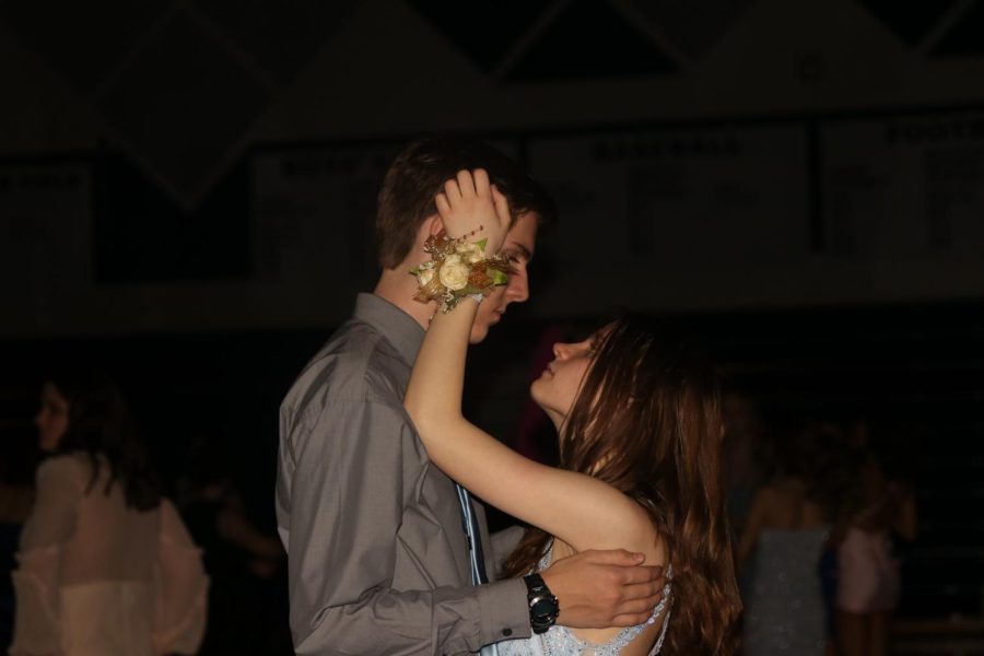 Looking at each other, juniors Garrett Cowen and Natalie Lawson have a moment together as they slow dance to a song