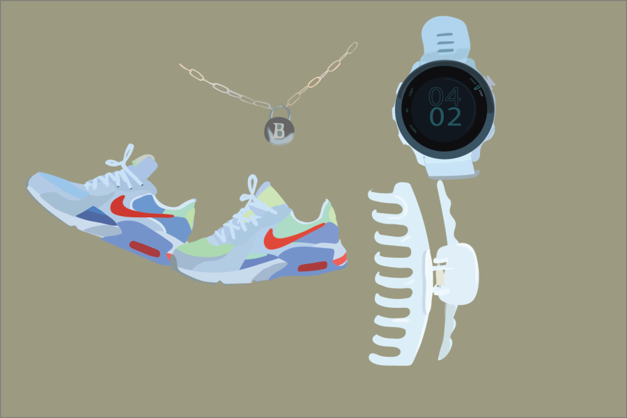 A few of Roys favorite outfit accessories include her running watch and shoes, her hair clip and one of her personalized necklaces.