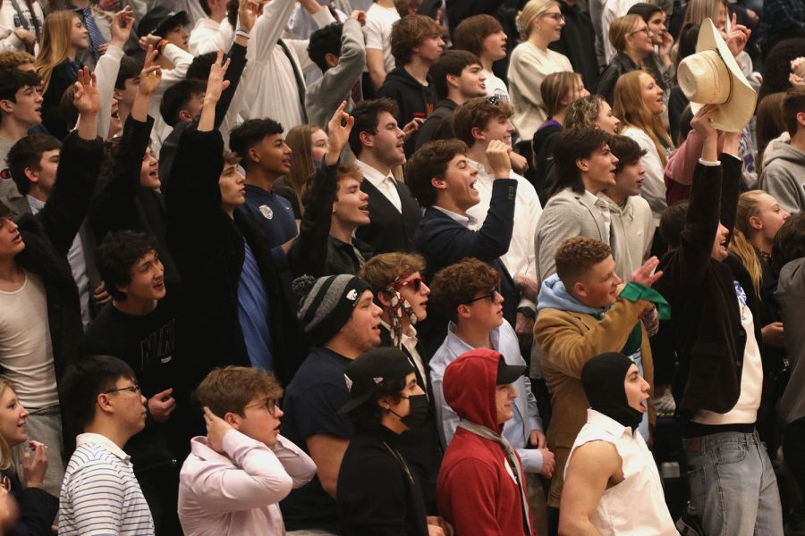The student section watches intently as the lady jags score. 