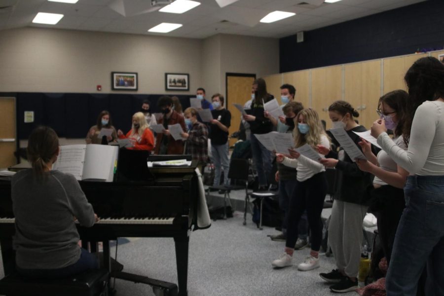 JagSingers practice in the choir room. Led by choir teacher and pianist on the left, Jessie Reimer.
