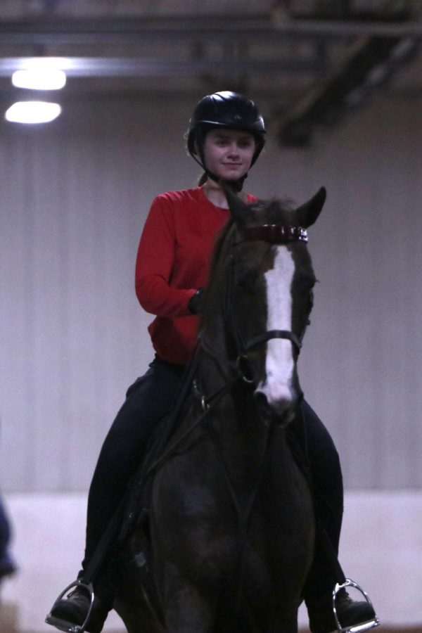 Sophomore Bryn Simpson rides her horse, Supernova.