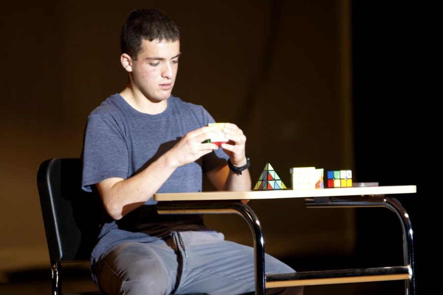 For the talent portion of the pageant, senior Vinny Bruno solves five Rubik's cubes in under two minutes.