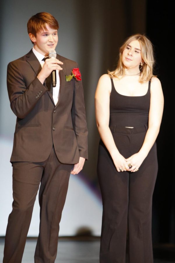 Participating in the formal wear portion of the show, junior Brody Shulda answers a question asked by one of the judges.