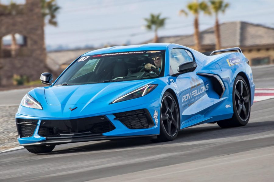 Operating his 2021 rapid blue convertible C8 Chevrolet Corvette, technology teacher Sean Endecott enjoys his new found skills on the Ron Fellows Performance Driving School race track. 