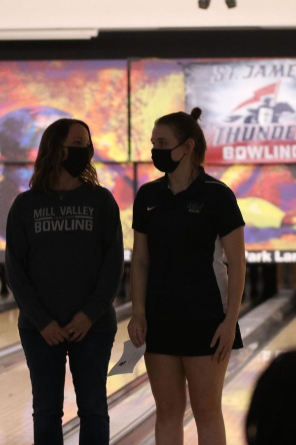 Beside her mom, senior Abby Hayes honors all of the seniors who have participated in bowling.
