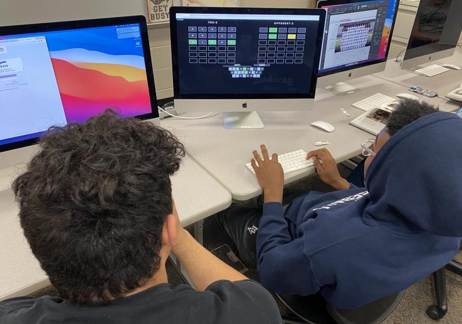 Sophomores Truman Griffith and Davion Harris battle with another classmate in Wordle during seminar Tuesday, March 29. They both play individually each day and sometimes play other friends in the partner version. 