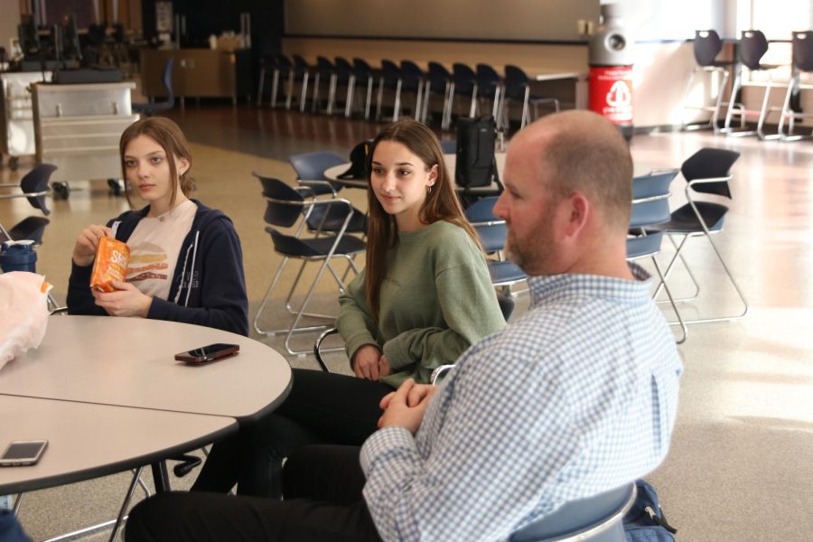 Listening to fellow Young Republicans group members, sophomores Maddison Moody and Tenley Moss discuss possible community service projects at their inaugural meeting Tuesday, Feb 15.
