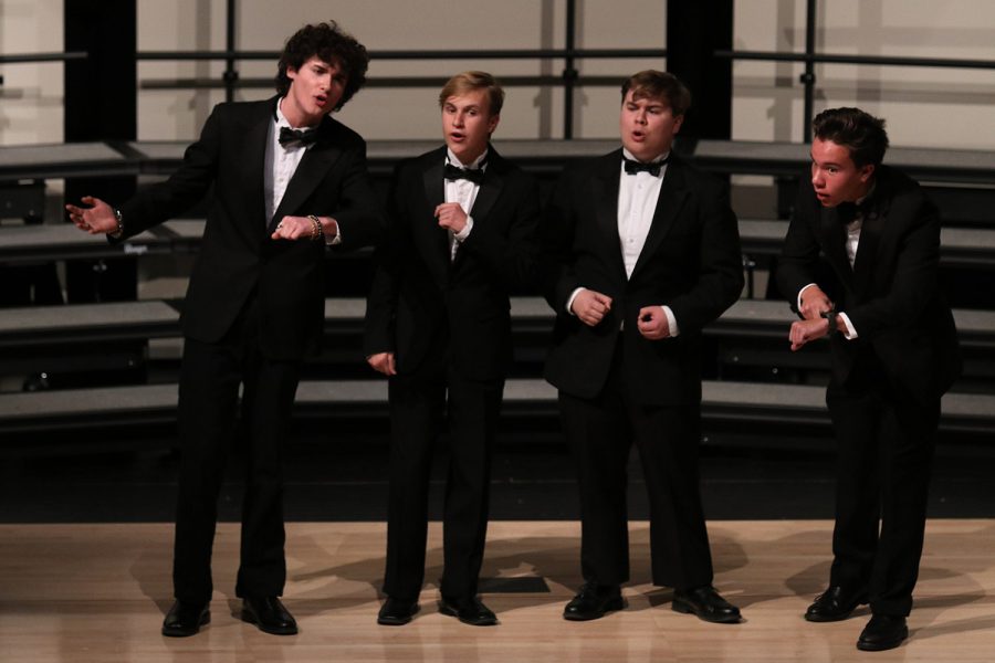 Singing together, juniors Brayden Heath, Carter Harvey, Luke O’Neil and sophomore AJ Lauer perform their quartet piece. 