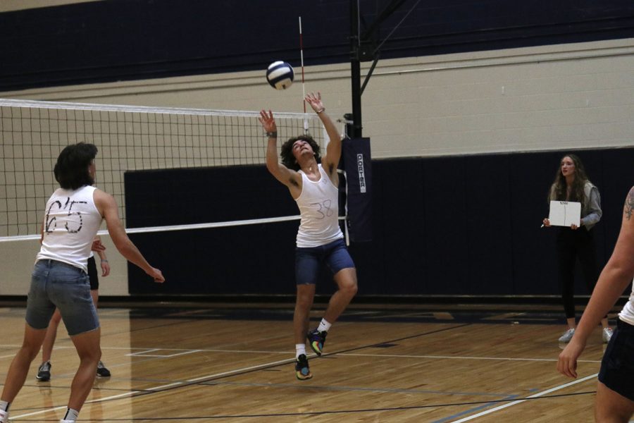 After passing the ball, senior Gage Foltz sets the ball up for his teammates Wednesday, March 30.