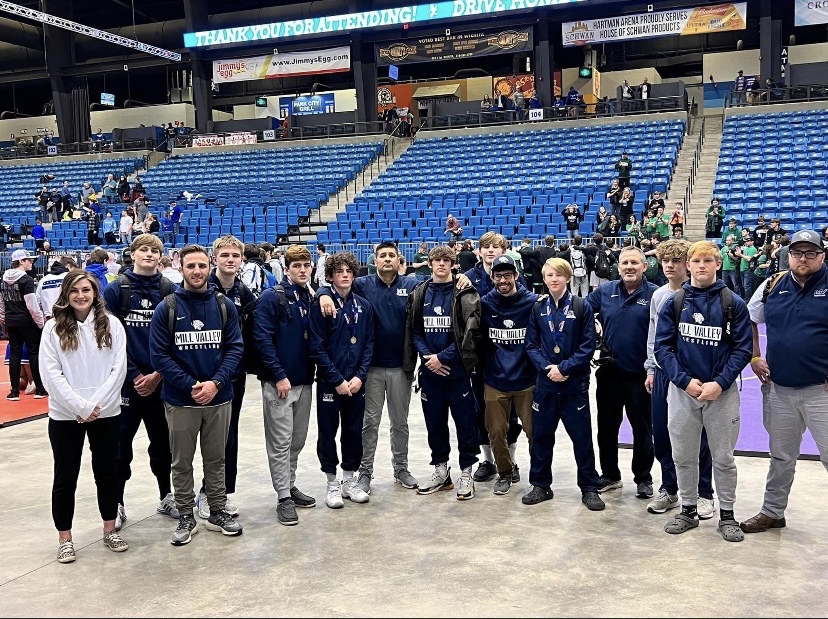 The wrestling team poses for a photo after the state meet Friday, Feb. 25.