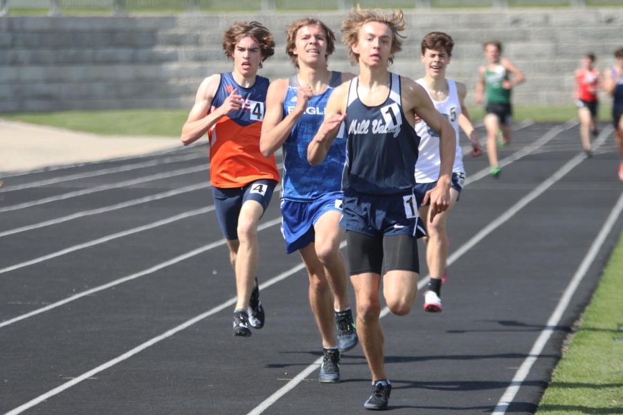 As he pulls ahead of his opponents, freshman Carter Cline gains the lead in the final 100 meters. 