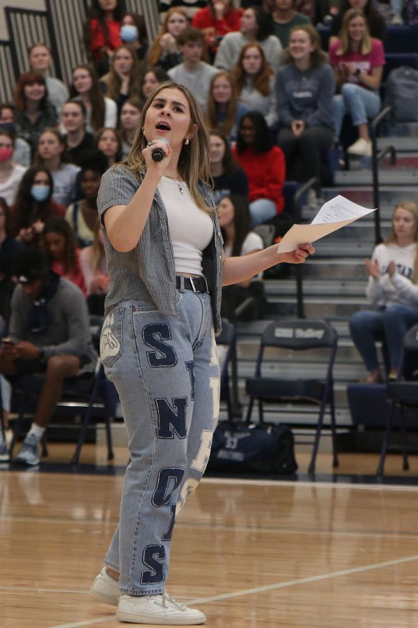 Microphone in hand, senior Elise Canning engages with the crowd.
