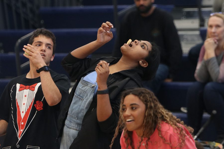 After moving the oreo down her face, senior McKarly Johnson finally gets the cookie in her mouth.